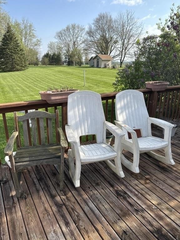 3-Outdoor Chairs (2-Hard Plastic Rocking Chairs)