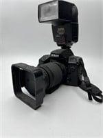 Nikon N70 with Sunpak power zoom 4000