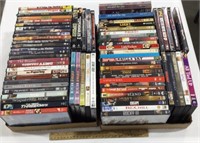 73 DVD movies including Rocky III, Show Girls, &