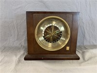 Assorted Stamps and Mantle Clock