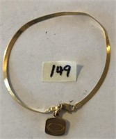 14kt. Gold Bracelet with "Kraft" Pendant