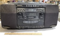 Sharp portable radio-cassette-CD player TURNS ON