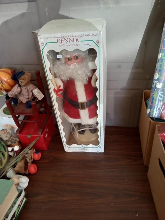 Rennoc animated Christmas Santa Claus in box