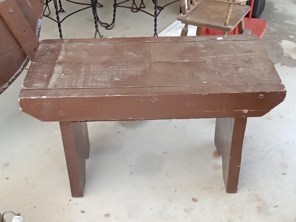 painted brown wood bench