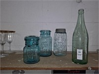 Three Blue vintage mason jars one Pluto water