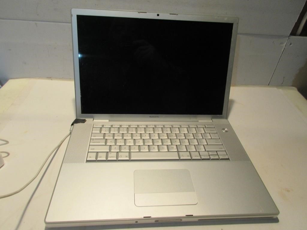 OLDER APPLE MCBOOK PRO W CHARGER- USED