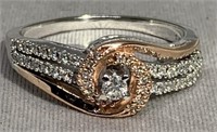 10KT WHITE GOLD WITH ROSE GOLD  .56CT DIAMOND RING