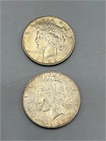 2 1920's peace silver dollars