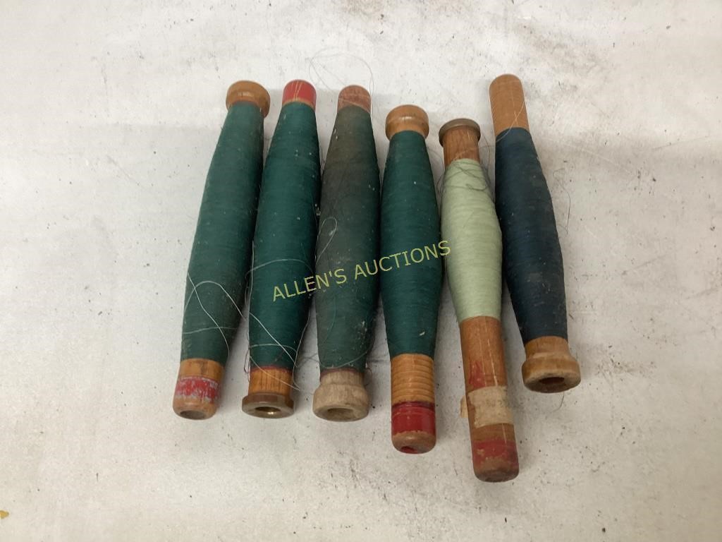 6 WOODEN BOBBINS WITH THREAD