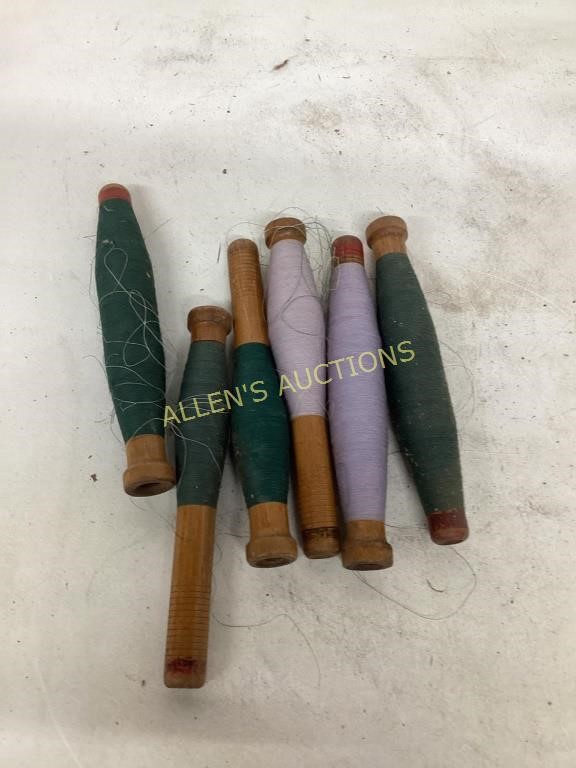 6 WOODEN BOBBINS WITH THREAD