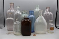 12 Antique Glass Medicine & Alcohol Bottles
