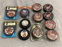 12 NHL Hockey Puck Memorabilia