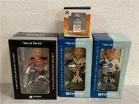 4 Bobble Head Dolls