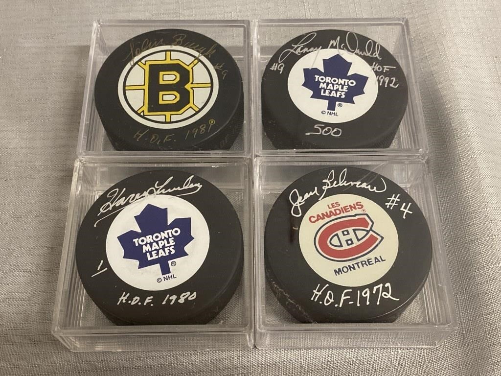 4 NHL Signed Hockey Puck Souvenirs