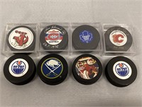 8 NHL Souvenir Pucks