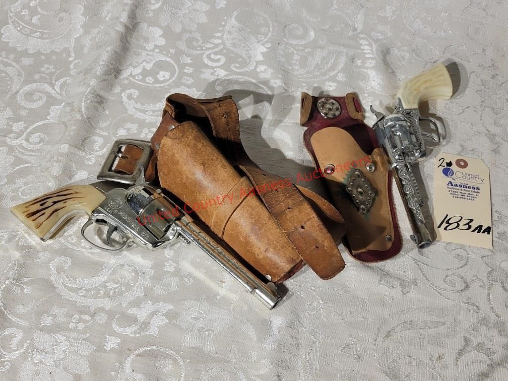 (2) Toy Six Shooter Revolvers