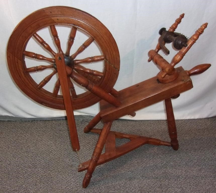 Vintage maple spinning wheel.