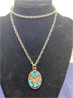 Silver tone necklace turquoise color