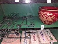 lot with art stone wall hanging ,metal wall rack,