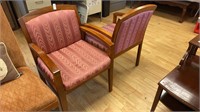 Two cushion wooden armchairs