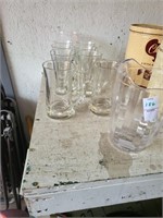 Glass mugs and 22 plastic pitchers