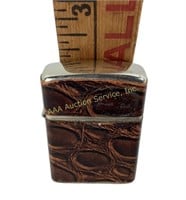 Champ Lighter made in Austria with brown faux