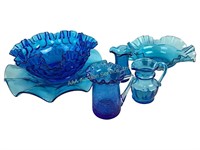 Ruffled blue dish and small pitchers