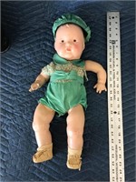Antique Doll With Cloths One Arm is Detached