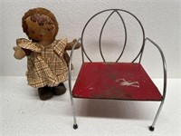 Baby doll and child’s chair