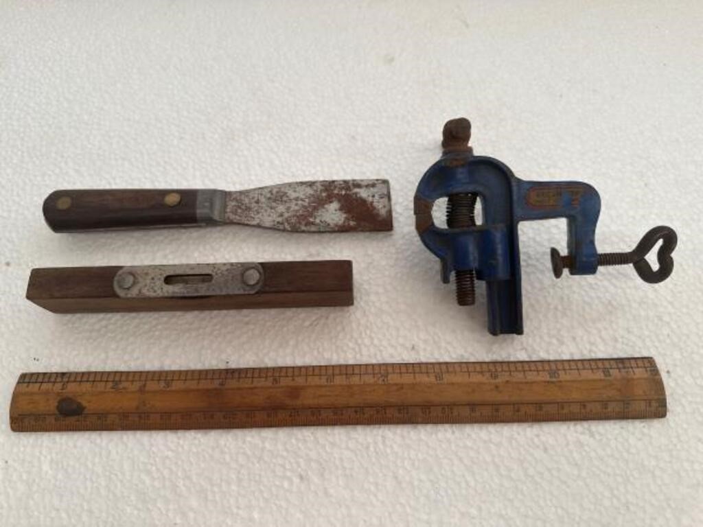 Hecsharp clamp on vise.  w/ other tools.
