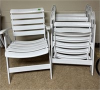 4 Hard plastic folding lawn chairs