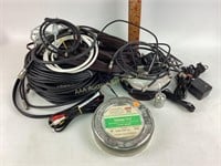 Kodak 35mm film can.  Assorted cables and cords