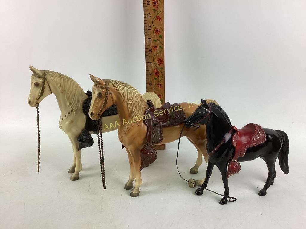 (3) plastic horse toys, one missing leg