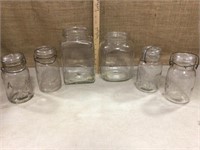 Square glass jars and quart jars.