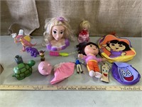 Toys - Tangled head, Dora, dinosaurs