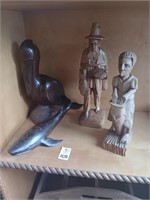 4 wood carvings figures