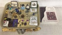 Jewelry Lot: brooches, pendants, and more