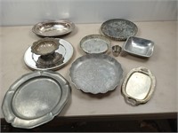 Multiple pieces of silver plate hammered a