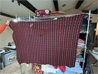 Red checkered blanket. Has hole see pics.