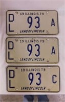 Three 1979 Illinois embossed metal dealer license
