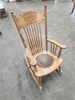 Antique oak press back spindle back racing chair