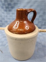 Antique stoneware 1 gallon brown top jug. Good
