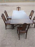 Antique dining room table with hidden extended
