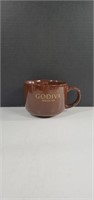 Modern Gourmet Foods Chocolate Brown Godiva Logo