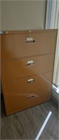 Metal filing cabinet located upstairs