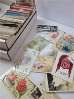 One box of unsorted postcards- from 1910 and later