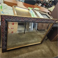 Large, heavy ornate framed mirror