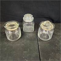 4 Glass storage jars w/ lids