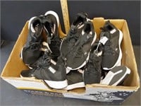 Box of new PUMA shoes sizes vary