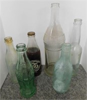 Vintage soda and beer bottles: Coca Cola Flat